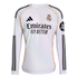 White long-sleeved Real Madrid soccer jersey with black stripes, orange piping, and sponsor logos including Adidas, Emirates, and HP.
