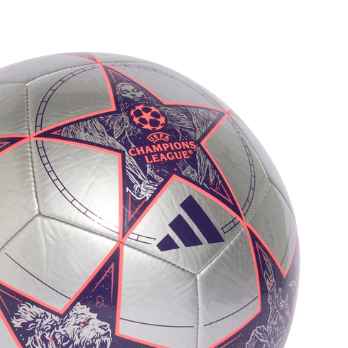 Close-up of a silver Adidas UEFA Champions League soccer ball featuring large purple stars with orange outlines and intricate graphics.