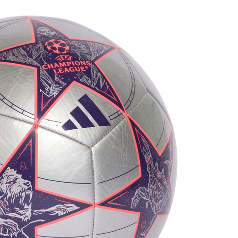 Silver Adidas UEFA Champions League soccer ball with purple star panels featuring intricate lion and character artwork.