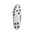 Sole of a white Adidas soccer cleat with black traction studs, shown against a solid black background.