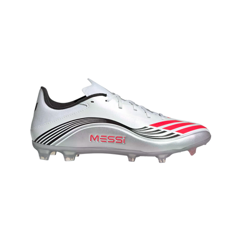 A silver soccer cleat with black wavy lines, red stripes, and "MESSI" branding on the side, shown from a side profile against a white background.