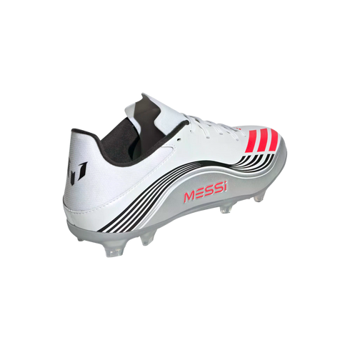 Rear-quarter view of a white Adidas Messi soccer cleat with black wavy stripes, silver accents, and pink "MESSI" lettering on the side.