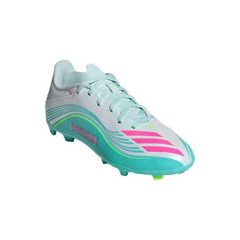 A light blue and teal soccer cleat with pink stripes and "MESSI" branding on the side, set against a black background.