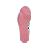 Bottom view of an Adidas shoe featuring a translucent pink rubber outsole with a geometric tread pattern and circular pivot points.