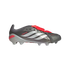 A metallic grey Adidas Predator soccer cleat with white stripes and a red fold-over tongue strap, shown from the side against a black background.