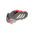 A dark grey Adidas Predator soccer cleat with white stripes and a red fold-over tongue, shown from a rear angle on a black background.