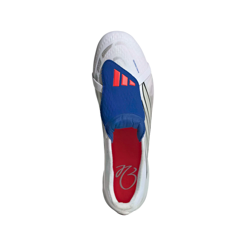 Top-down view of a white athletic shoe with a blue lace shroud featuring three orange stripes and a red insole with script, set against a black background.