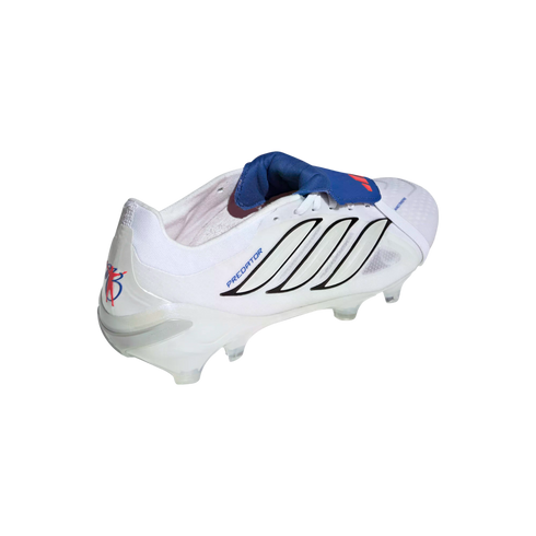 White Adidas Predator soccer cleat with black stripes and a blue fold-over tongue, featuring a David Beckham logo on the heel, isolated on a black background.