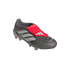 A grey and black Adidas Predator soccer cleat with silver stripes and a red fold-over tongue featuring a white logo, isolated on a black background.