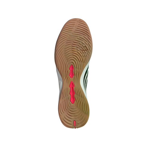 Underside of a gum rubber indoor soccer shoe sole with a rippled tread pattern and bright pink accents centered on a black background.