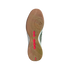 Underside of a gum rubber indoor soccer shoe sole with a rippled tread pattern and bright pink accents centered on a black background.