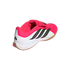A side-rear view of an Adidas Predator indoor soccer shoe in pink, white, and black with a gum rubber sole and "Lightstrike" cushioning.