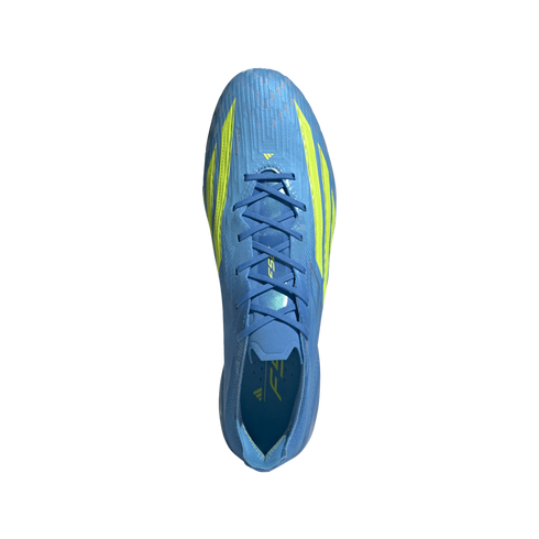 A top-down view of a bright blue Adidas soccer cleat with neon yellow accents and blue laces, centered against a solid black background.