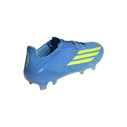 A bright blue soccer cleat with neon yellow accents, including three slanted stripes on the side and "F50" on the heel, shown against a solid black background.