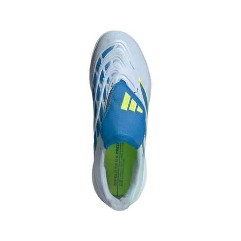 A top-down view of a light grey Adidas soccer cleat with blue and lime yellow accents. The shoe features blue geometric patterns on its sides, a blue tongue flap with yellow stripes, and a bright lime green insole.