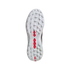 Textured white outsole of an athletic shoe with prominent red accents in the center and heel, shown against a plain black background.