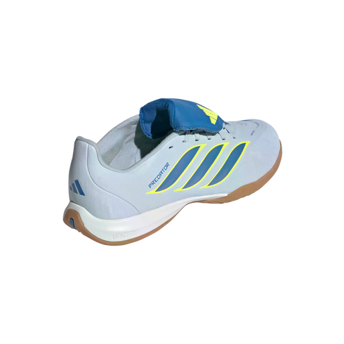 A rear three-quarter view of a light blue Adidas Predator indoor soccer shoe against a black background. The shoe features three diagonal dark blue stripes outlined in yellow on the side and the word "PREDATOR" in blue. It has a prominent blue fold-over t