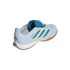 A rear three-quarter view of a light blue Adidas Predator indoor soccer shoe against a black background. The shoe features three diagonal dark blue stripes outlined in yellow on the side and the word "PREDATOR" in blue. It has a prominent blue fold-over t