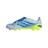 A side profile of a light grey and blue soccer cleat with a bright neon yellow studded soleplate and a blue fold-over tongue, shown against a black background.