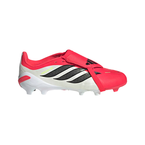 A side view of a red and white Adidas Predator soccer cleat featuring black stripes, a fold-over tongue with a strap, and a white studded outsole.