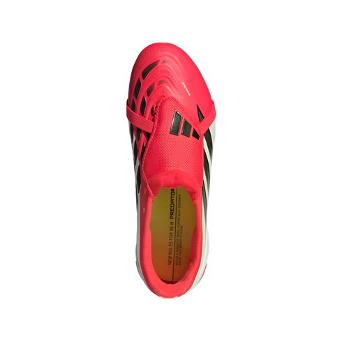 Top-down view of a red Adidas Predator soccer cleat with black accents, a fold-over tongue, and a yellow insole, set against a black background.