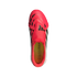Top-down view of a red Adidas Predator soccer cleat with black accents, a fold-over tongue, and a yellow insole, set against a black background.