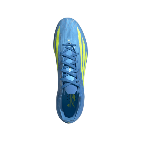 A top-down view of a light blue adidas F50 soccer cleat with neon yellow stripes, set against a solid black background.