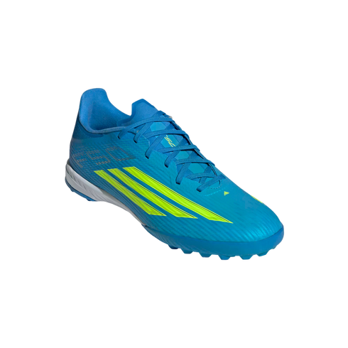 A bright blue Adidas F50 soccer cleat with lime green stripes, featuring blue laces and a studded sole, set against a solid black background.
