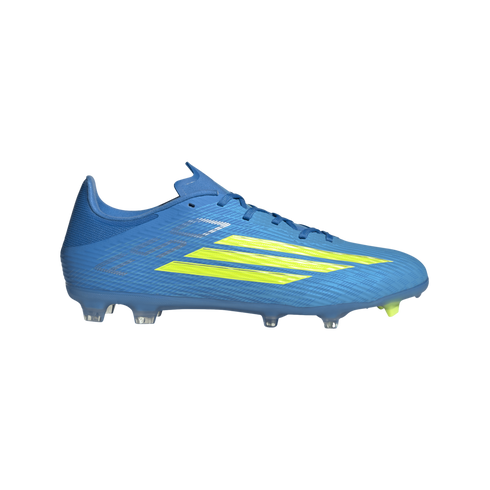 A side view of a bright blue Adidas soccer cleat with three tapering neon yellow stripes and a textured upper, set against a black background.