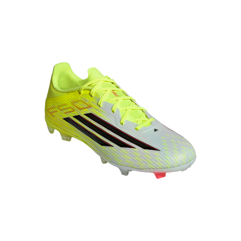 A neon yellow and white Adidas soccer cleat with three black stripes on a black background.