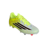 A neon yellow and white Adidas soccer cleat with three black stripes on a black background.