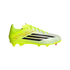 A neon yellow and silver Adidas soccer cleat with black stripes and red accents, shown from the side against a black background.
