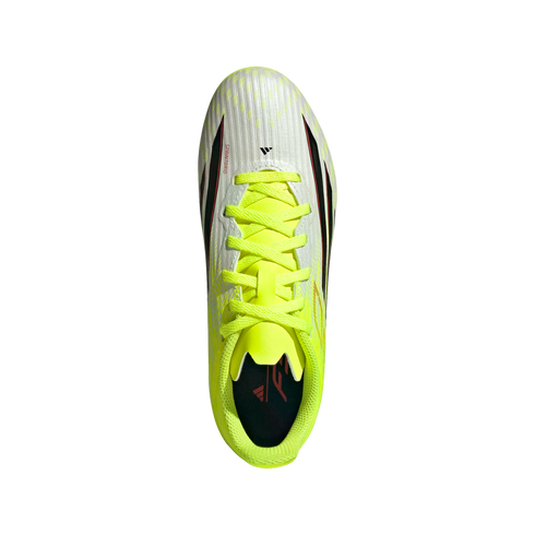 Top-down view of a white and neon yellow Adidas soccer cleat with bright yellow laces and black and red accents.