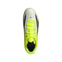 Top-down view of a white and neon yellow Adidas soccer cleat with bright yellow laces and black and red accents.