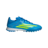 A side-profile view of a bright blue Adidas turf soccer shoe with three neon yellow stripes and a white midsole, set against a black background.