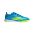 Profile view of a blue indoor soccer shoe featuring three slanted yellow stripes on the side, blue laces, a white midsole, and a lime green textured outsole.
