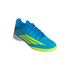 A bright blue and neon yellow Adidas indoor soccer shoe with a textured upper and three diagonal stripes on the side, set against a plain black background.