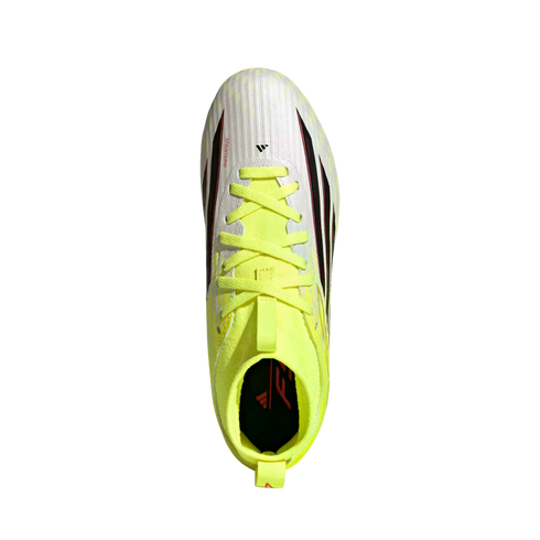 Top-down view of a white Adidas soccer cleat with neon yellow laces and collar, featuring black and pink side accents.
