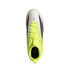 Top-down view of a white Adidas soccer cleat with neon yellow laces and collar, featuring black and pink side accents.