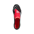 Top-down view of a black Adidas Predator soccer cleat with white stripes and a prominent red fold-over tongue featuring "EST. 1994" text. The interior is bright red.