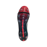 Underside of a red and black Adidas Predator soccer cleat featuring a translucent soleplate, studs, and "POWERSPINE" text against a black background.