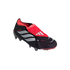 A black and red Adidas Predator soccer cleat with three silver stripes and a fold-over tongue, isolated against a solid black background.