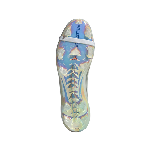Bottom of an iridescent Adidas Predator soccer cleat with clear studs and a white strap across the forefoot, shown against a black background.