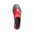 Top-down view of a grey and red Adidas Predator soccer cleat with a red fold-over tongue featuring "EST. 1994" and "PREDATOR" printed on the insole, set against a black background.
