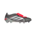A grey Adidas Predator football boot with three white stripes and a red fold-over tongue, shown in a side profile on a black background.