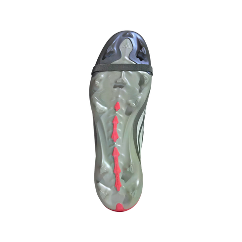 The underside of an Adidas soccer cleat with a translucent grey sole, red PowerSpine accents, and a black elastic strap across the front.