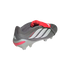 Grey Adidas Predator soccer cleat with white stripes and a red fold-over tongue on a black background.