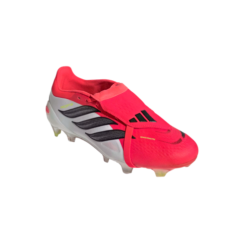 A pink and white Adidas Predator soccer cleat with a fold-over tongue and black stripes, displayed against a black background.