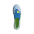 A top-down view of a light blue Adidas Predator soccer cleat, featuring a prominent blue fold-over tongue with yellow stripes and a bright yellow insole with printed text.