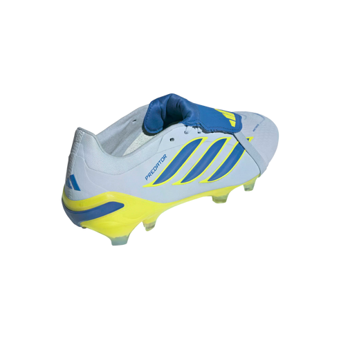 A light blue and yellow Adidas Predator soccer cleat with a fold-over tongue, set against a solid black background.